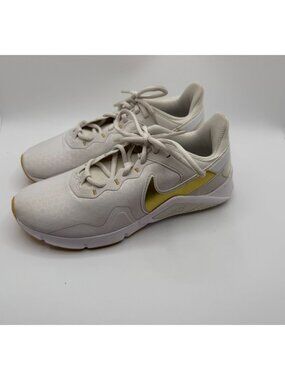 Nike Legend Essential 2 Trainers Women Size 7.5 Platinum Tint/Metallic Gold Star